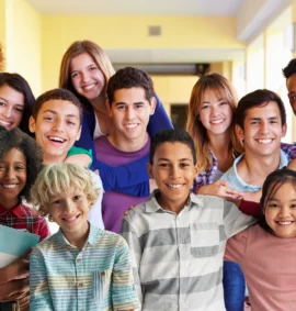 A diverse group of students connecting in a school hallway