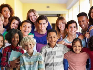 A diverse group of students connecting in a school hallway